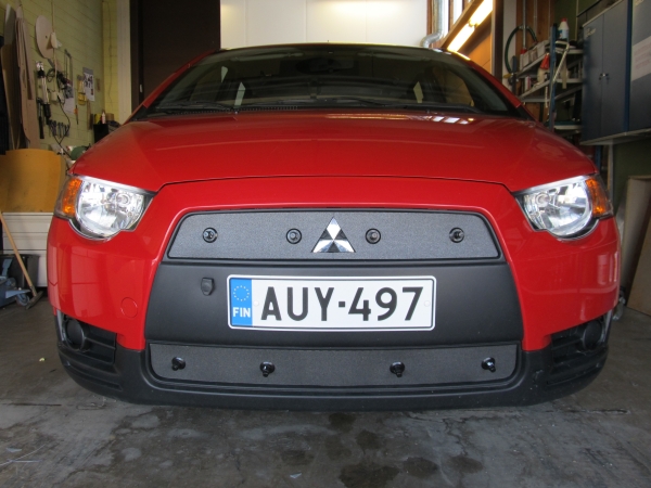 Trim/Protection Strip, radiator grille Mitsubishi Colt 2009-
